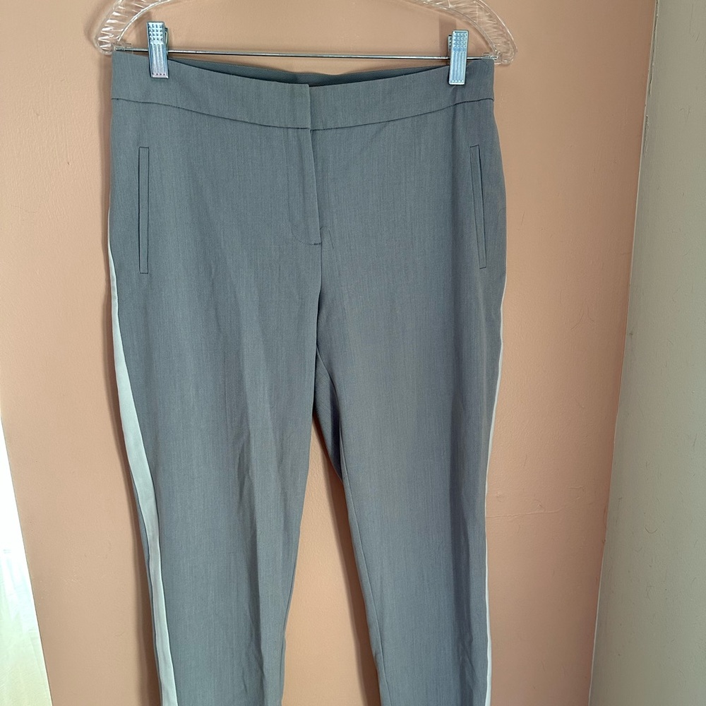 grey and white slacks